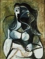 Mujer sentada en un sillón cubista de 1917 Pablo Picasso